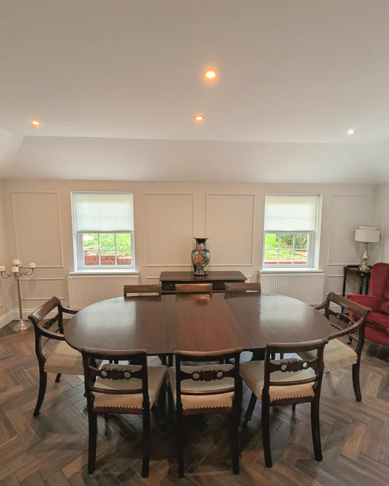 Dining room with fitted wall panelling, finished and painted