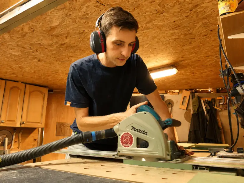 Will cutting timber at the bench in his Talgarth workshop